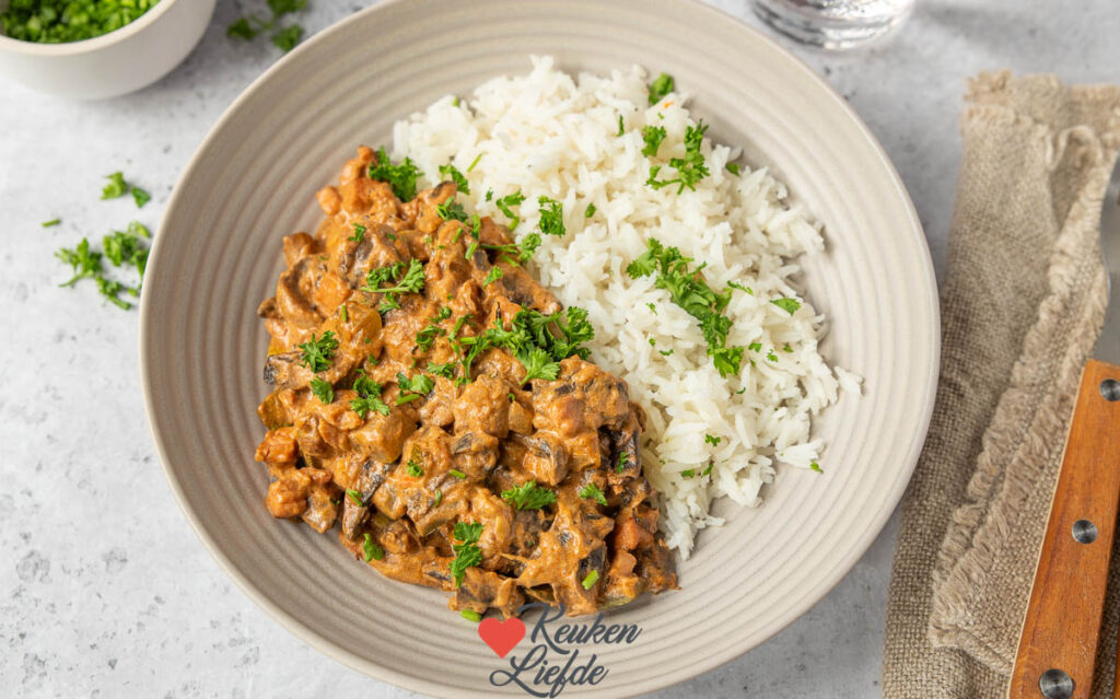 Romige courgette met spekjes en champignons